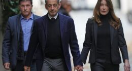 Former French President Nicolas Sarkozy and his wife Carla Bruni-Sarkozy leave their Paris home on Tuesday as Nicolas Sarkozy heads to prison to serve time for a criminal conspiracy to finance his 2007 election campaign with funds from Libya