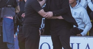 Russell Martin is embraced by Livi boss David Martindale after Sunday's away victory