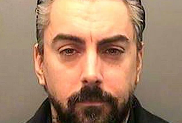 The inmate who killed paedophile Ian Watkins, pictured, in his prison cell is believed to have been 'serving time for murder'