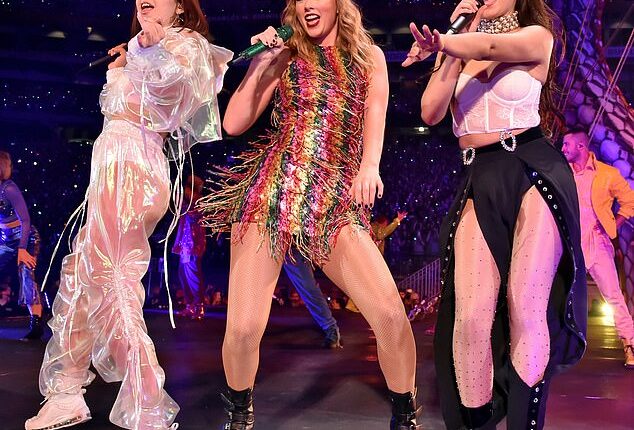 Are former tour mates Charli XCX and Taylor Swift feuding? Pictured together onstage in 2018