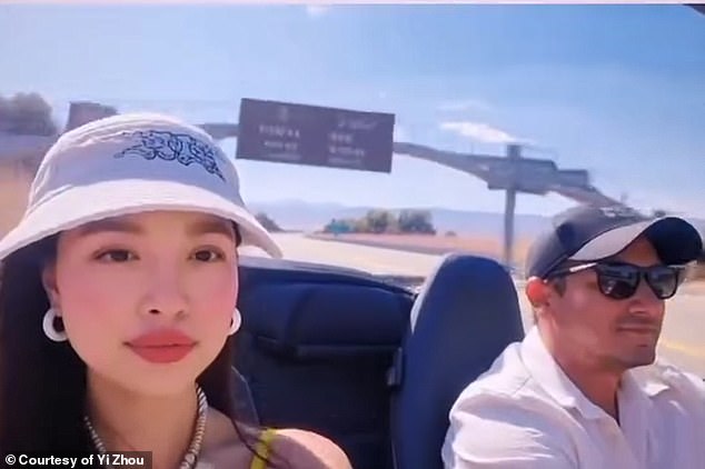 Chinese-born filmmaker Yi Zhou - pictured in a selfie with Jeremy Renner - told the the Daily Mail she began dating the actor in recent months