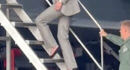 Kate amazed fans with her ability to flawlessly strut up and down an aircraft's boarding stairs in her navy stilettos from Stuart Weitzman