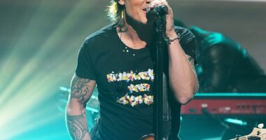 Keith Urban, 57, dropped the 2016 track The Fighter out of his setlist during Thursday's concert in Hershey, Pennsylvania amid his shock divorce from Nicole Kidman; seen in 2024 in Burbank