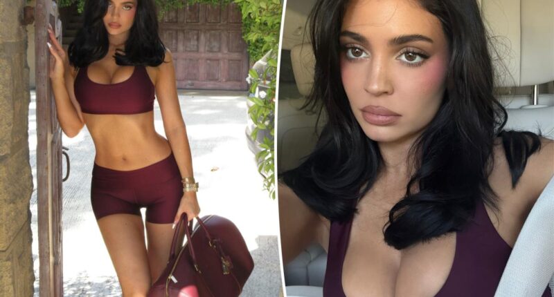 Kylie Jenner models her rock-hard abs in skintight yoga set