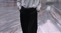 Sunday Rose Kidman-Urban, 17, in a grey blouse, black neck tie and black pleat-fronted trousers, appeared on the catwalk