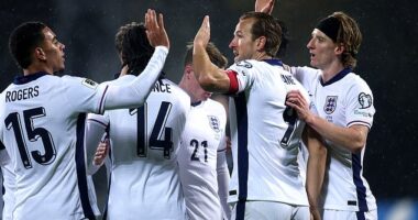 England sealed qualification to the World  Cup next summer with a huge 5-0 win over Latvia