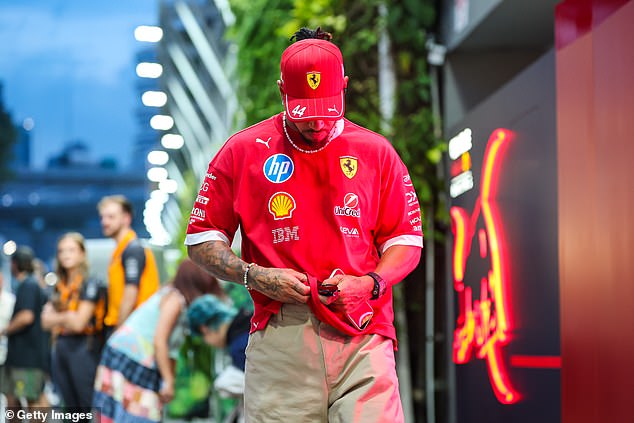 Lewis Hamilton cuts a lonely figure without his beloved vegan dog Roscoe on his return to the F1 paddock, after he was forced to have him put down