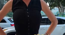 Kate Cassidy was heckled by a male admirer as she posted a bizarre video of her navel piecing on Instagram on Wednesday