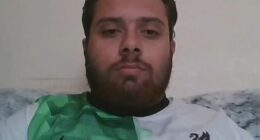 Bus driver Isaac, 21, (above) was sacked after wearing a Liverpool shirt, leading to travel chaos
