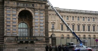 The world-famous Louvre museum in Paris has closed after a gang stole jewellery worth millions (pictured: French police officers next to a ladder propped up against the tourist site)