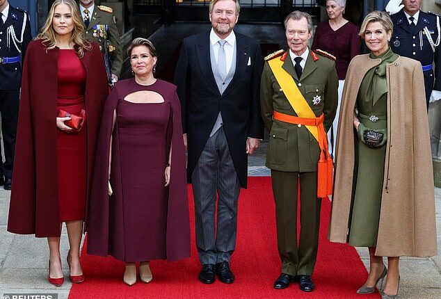 Ahead of the abdication ceremony on Friday, Luxembourg's Grand Duke Henri and Grand Duchess Maria Teresa pose for a picture with Dutch King Willem-Alexander, his wife Queen Maxima and their daughter, Princess Catharina-Amalia