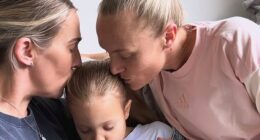 Matildas star Tameka Yallop (right) welcomes the new addition to her family, baby Nova