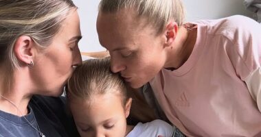 Matildas star Tameka Yallop (right) welcomes the new addition to her family, baby Nova