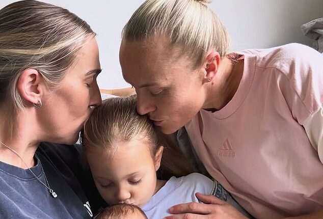 Matildas star Tameka Yallop (right) welcomes the new addition to her family, baby Nova