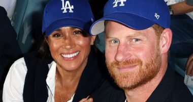 Meghan Markle, left, glimmered from the bleachers last night as she enjoyed an atmospheric evening watching the LA Dodgers baseball game with Prince Harry, right, just hours after launching a festive collection for her lifestyle brand