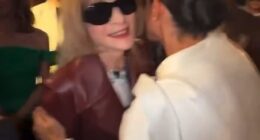 Meghan looks in her element as she embraces Vogue's global editorial director Anna Wintour