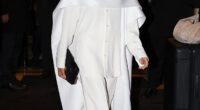 Meghan Markle cut a stylish figure on Saturday as she was pictured in Paris for Fashion Week while being flanked by bodyguards