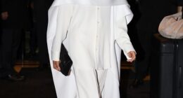 Meghan Markle cut a stylish figure on Saturday as she was pictured in Paris for Fashion Week while being flanked by bodyguards