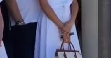 Meghan Markle showed off her designer wardrobe in a Carolina Herrera dress, Jimmy Choo heels and a Loro Piana handbag as she attended the George Zaifen Tennis Tournament