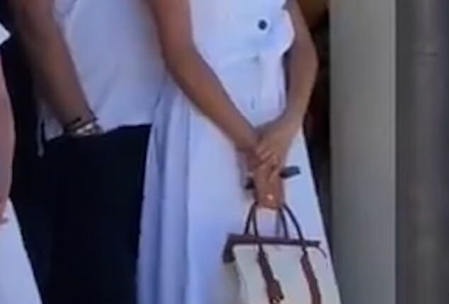 Meghan Markle showed off her designer wardrobe in a Carolina Herrera dress, Jimmy Choo heels and a Loro Piana handbag as she attended the George Zaifen Tennis Tournament