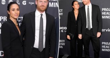 Meghan Markle stuns in black suit for rare red carpet appearance with Prince Harry