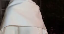 Regal catwalk: It appears Meghan had her own model moment as she strutted in front of numerous cameras while exiting the star-studded show Balenciaga show in Paris this weekend