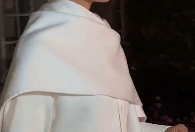 Regal catwalk: It appears Meghan had her own model moment as she strutted in front of numerous cameras while exiting the star-studded show Balenciaga show in Paris this weekend