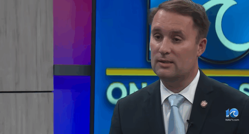 Jason Miyares talking during an interview.