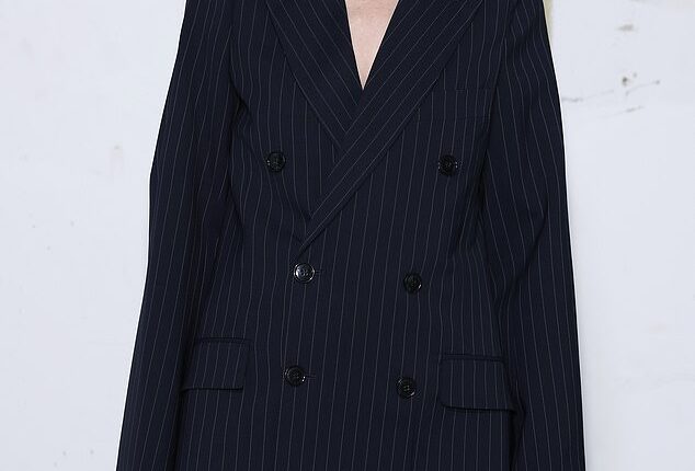 Kelly Rutherford made a rare public appearance with her son during a Paris Fashion Week outing on Friday
