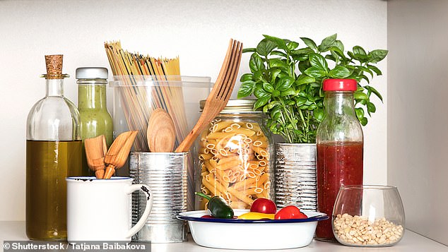 A common kitchen ingredient may be the secret laundry hero you never knew you needed: distilled white wine vinegar (stock image)