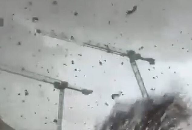 The freak weather event hit the region of Ermont in Val d'Oise causing three cranes to come crashing down