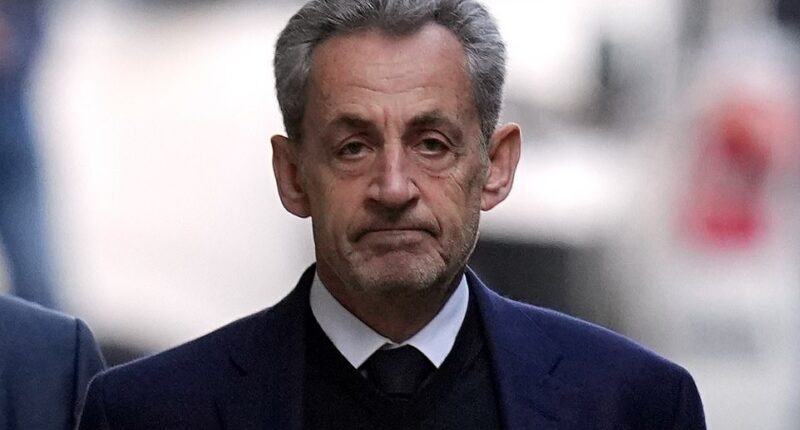 The disgraced French ex-president Nicolas Sarkozy spent his first night in prison being mocked for his height and screamed at by fellow inmates. He was placed under police protection inside La Santé, the high-security jail in Paris, following the ‘frightening’ night, when a fellow inmate also appeared to film himself threatening him. Two police officers have since moved into the prison cell next door to Sarkozy following the incident, it emerged today. Sarkozy was incarcerated on Tuesday, following a five-year sentence for conspiring to accept laundered cash from the late Libyan dictator, Colonel Muammar Gaddafi. One video showed prisoners shouting insults at ‘Little Nikola’ (sic), who is just under 5ft 5ins tall.