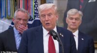 Robert F Kennedy Jr was seen using a cough to covertly put something in his mouth - which appeared to be a nicotine pouch or gum - at a press conference with the president Tuesday