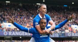 Derek Cornelius enjoys the  moment with Thelo Aasgaard after scoring the opener at Ibrox
