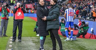 Danny Rohl and Russell Martin embrace each other after a match in the English Championship