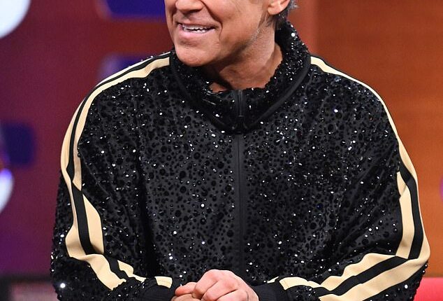 Robbie Williams left Julia Roberts speechless when he made a wild prostitute confession during their appearance on Friday