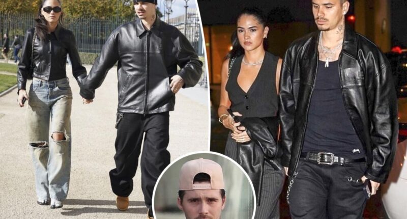 Romeo Beckham and Kim Turnbull hold hands in Paris after reigniting romance