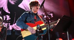 Ryan Adams (pictured) has issued a grovelling apology after fans slammed his chaotic Melbourne concert - and took a pointed swipe at his ex-wife Mandy Moore in the process