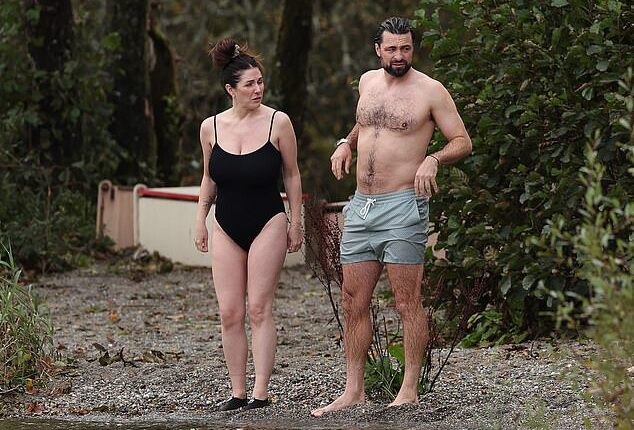 Russell Martin, pictured with model girlfriend Lucy Pinder, enjoyed a romantic dip in Loch Lochond following his sacking at Rangers