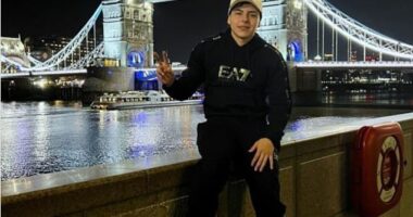 Israel Contreras poses in front of London's Tower Bridge
