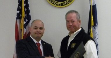 William 'Billy' Squires, left,  a deputy with the Beaufort County Sheriff's Office since 2005 has been fired in disgrace after pointing a loaded firearm at teenagers in his own neighborhood - all while allegedly under the influence of alcohol