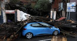 Storm Amy batters Britain with cars smashed and trees downed as weather warning extended