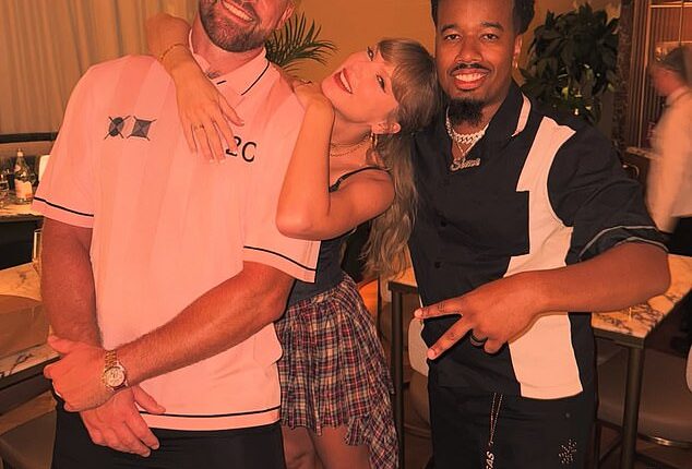 Travis Kelce and Taylor Swift pictured at his Kansas City restaurant on Sunday night