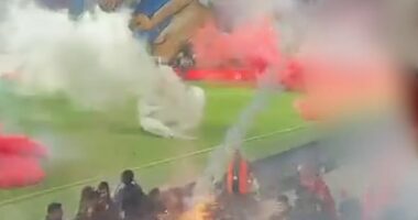 The Tel Aviv football derby has been cancelled over the 'risk to human lives' after riots broke out inside and outside the stadium