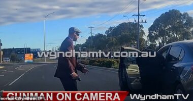 Terrifying moment crazed gunman dressed in a flat cap and maroon blazer forces driver out of their vehicle during wild carjacking spree in Melbourne - and the very odd five-word phrase he yelled before getting behind the wheel