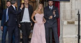 The Beckhams put on a united front as they were pictured leaving their hotel for Victoria's Paris Fashion Week Show on Friday