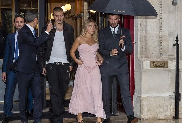 The Beckhams put on a united front as they were pictured leaving their hotel for Victoria's Paris Fashion Week Show on Friday