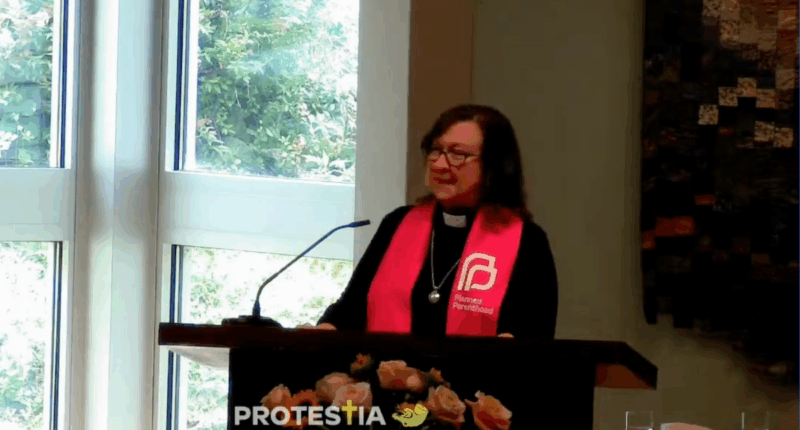 Rebecca Todd Peters speaking in Planned Parenthood garb