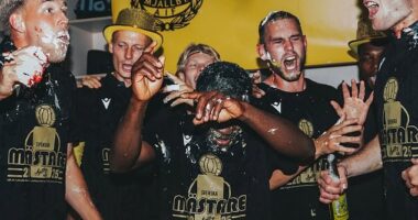 Mjallby's players stuffed their faces with cake and sprayed champagne after winning the title