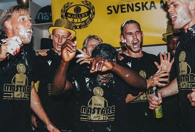 Mjallby's players stuffed their faces with cake and sprayed champagne after winning the title